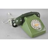 A GPO two tone green 746 rotary telephone