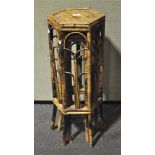 A pair of bamboo plant stands,