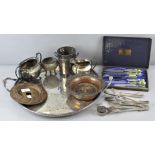 A collection of silver plate, to include a tray, flatware, wine bottle coaster and other items,