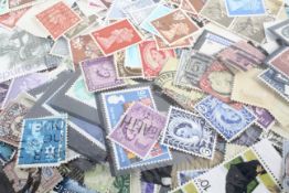 A packet of UK stamps covering from Queen Victoria,