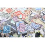 A packet of UK stamps covering from Queen Victoria,