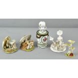 Four porcelain funghi sculptures, 11cm high; and a 19th century ormulu mounted scent bottle,