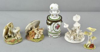 Four porcelain funghi sculptures, 11cm high; and a 19th century ormulu mounted scent bottle,