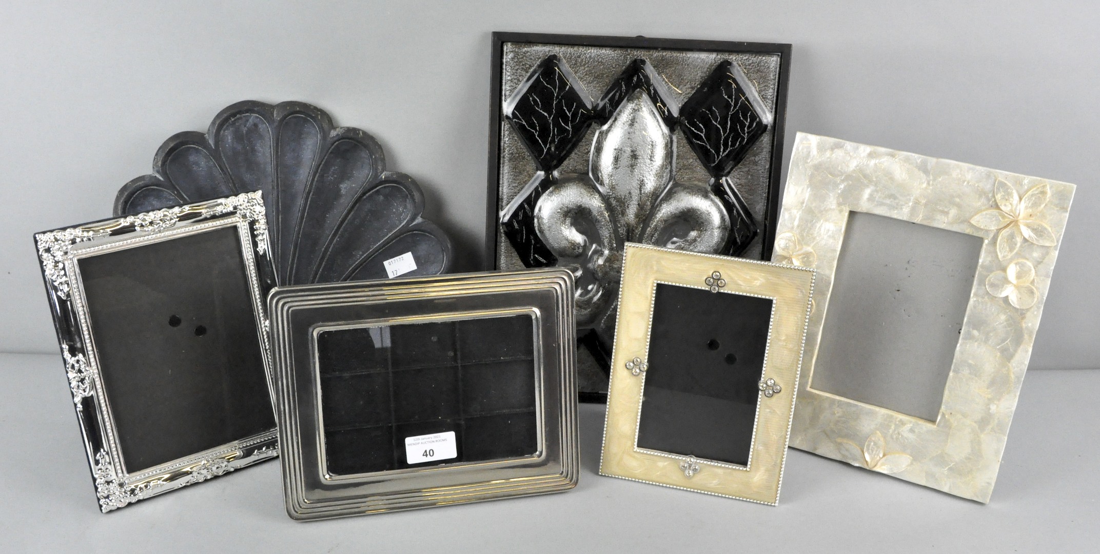 A collection of assorted photograph frames together with two decorative plaques,