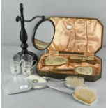 A collection of assorted dressing table items,