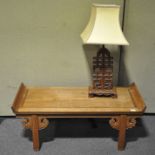 A 20th century Chinese style coffee table, 109cm long,