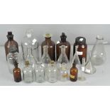 A collection of assorted glass, to include apothecary/chemists style bottles and funnels,