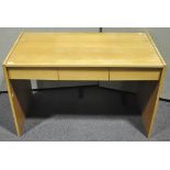 A wooden desk, three drawers and files under a sliding top,