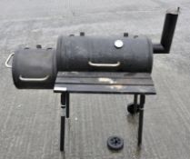 A 'Landmann' barbeque and cover,