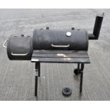 A 'Landmann' barbeque and cover,