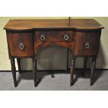 A large late 19th century Mahogany sideboard with two large deep drawers and a single central draw,