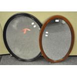 Two oval mirrors, to include a Victoria plate glass mirror and an Edwardian example,