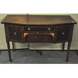 An Edwardian mahogany and inlay bow front sideboard having two central drawers