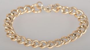 A heavy weight gold plated silver curb link bracelet, 9 inch length, lobster clasp.