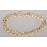 A heavy weight gold plated silver curb link bracelet, 9 inch length, lobster clasp.