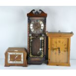 A Deco mantel clock, pine wall clock and Japanese wall clock.