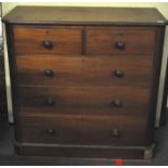 A Victorian Mahogany Two over Three chest of drawers, knob handles on plinth base,