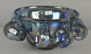 A carnival glass punch bowl set,