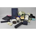 A large collection of jewellery boxes, watch boxes and pouches.