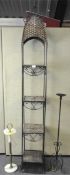 A metal stand, 200cm high; together with a candle stand and an ashtray