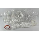 A large collection of cut glass and crystal to include decanters, celery wine glass and other items,