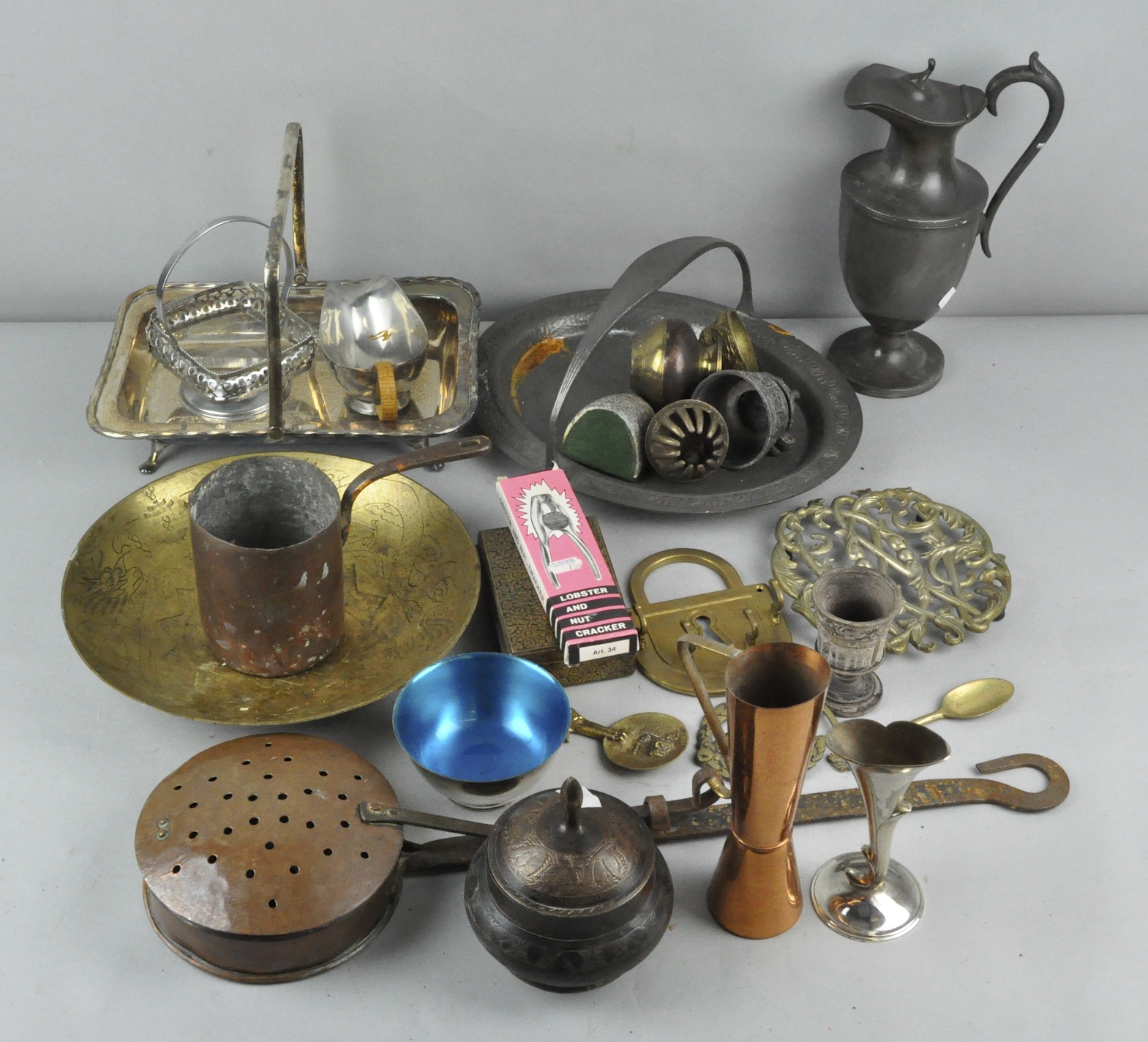 A collection of assorted metalware brass bowl, pewter jug, brass bowl and copper items.