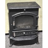 A cast iron log burner. Measures; 58cm x 43cm.