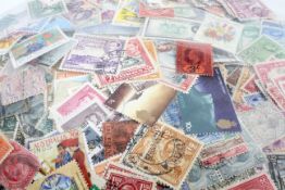 A large packet of Commonwealth stamps, no GB,