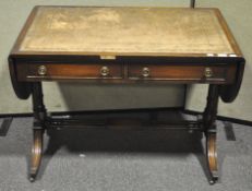 A leather topped table,