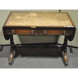 A leather topped table,