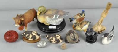 A collection of ceramic and other animals, to include ducks and a cow. Tallest; 18.5cm.