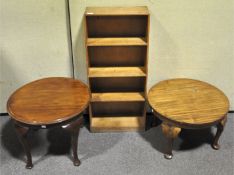 Two wooden coffee tables and a set of shelves,