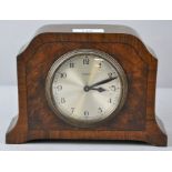 An early 20th century walnut mantle clock, 8 day movement,