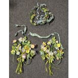 A pair of painted metal floral girandoles, 42cm high,