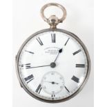 An open face pocket watch. Circular white dial signed James V Yolland. Key wound movement.