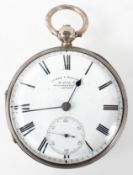 An open face pocket watch. Circular white dial signed James V Yolland. Key wound movement.