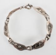 A silver 835 leaf bracelet with bolt ring clasp.