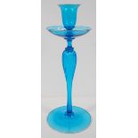 A Venetian glass candlestick with broad drip tray and twisting baluster column,