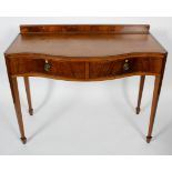 A Regency style mahogany and cross banded serpentine serving table,