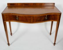 A Regency style mahogany and cross banded serpentine serving table,