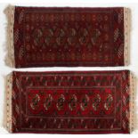 A near pair of Tekke Bokhara style rugs, with Kelim ends, 110cm x 51cm,