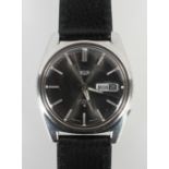 A stainless steel Seiko wristwatch. Automatic movement.