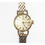 A vintage Ladies 18ct gold cased Omega wristwatch with 17 jewel manual wind movement,