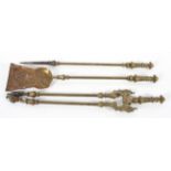 A three piece fire iron set, with foliate cast handles, and an embossed shovel,