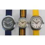 A collection of three wristwatches of variable designs to include an Aero mechanical and a Sicura