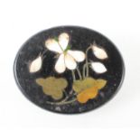 A Pietra Dura brooch with gold plated fittings. 12.7 grams