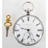 An open face pocket watch. Circular white dial, signed C Guinand 7405. Key wound movement.