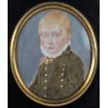 A 19th century miniature of a young boy, in ebonised frame,