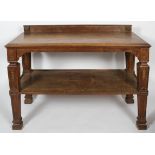 A Victorian pollard oak buffet, with a raised back, tapering and carved square section logs,