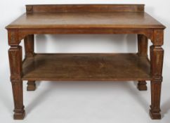A Victorian pollard oak buffet, with a raised back, tapering and carved square section logs,